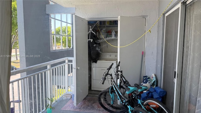 laundry area with washer / dryer