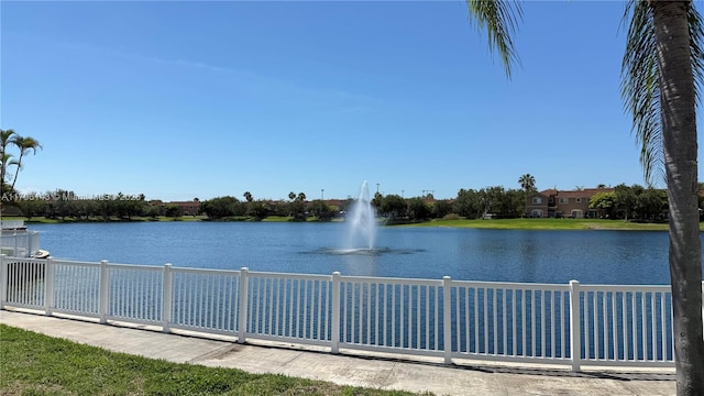 water view featuring fence