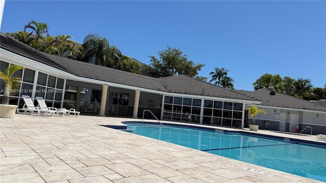community pool with a patio