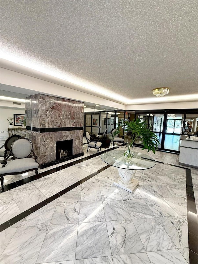 800 NE 195th St Unit 720, Miami, FL 33179 - common area featuring a textured ceiling
