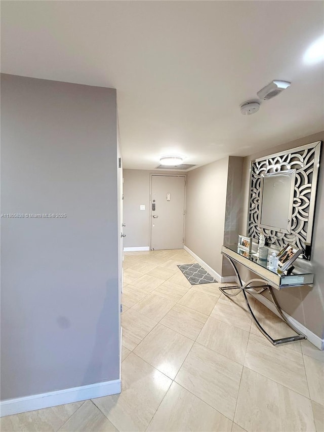 800 NE 195th St Unit 720, Miami, FL 33179 - hall featuring baseboards