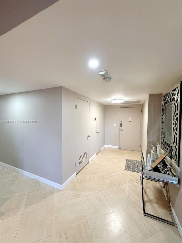 800 NE 195th St Unit 720, Miami, FL 33179 - corridor with baseboards