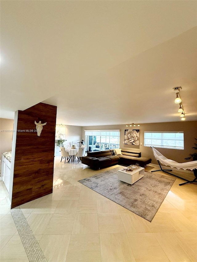 800 NE 195th St Unit 720, Miami, FL 33179 - living room with track lighting and healthy amount of natural light