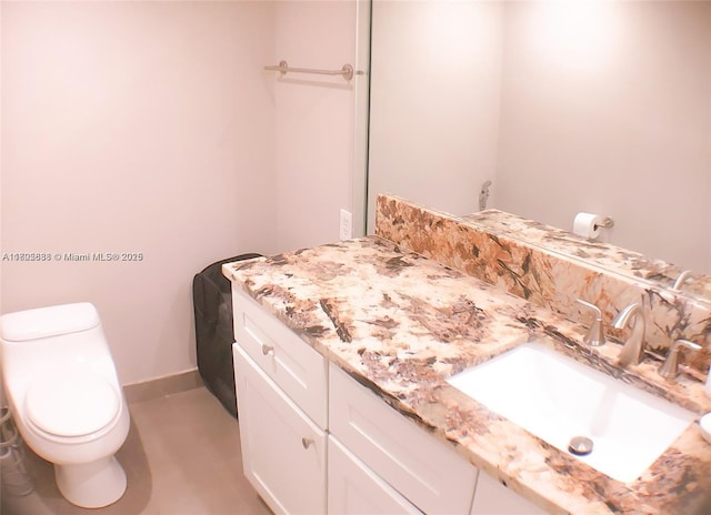 800 NE 195th St Unit 720, Miami, FL 33179 - half bathroom with vanity, baseboards, and toilet
