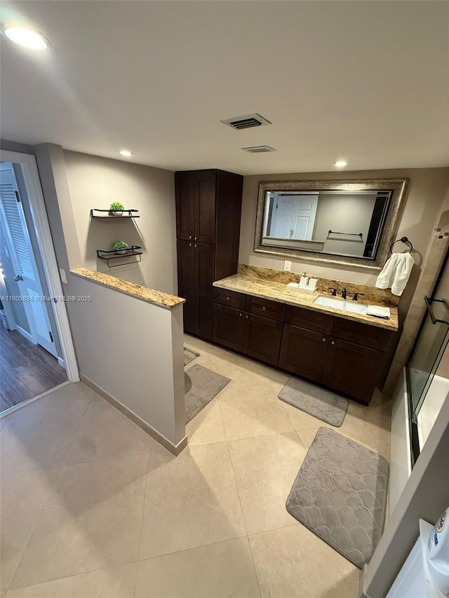 800 NE 195th St Unit 720, Miami, FL 33179 - bathroom with vanity, recessed lighting, and tile patterned flooring