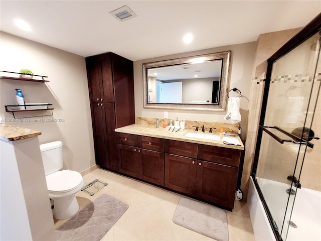 800 NE 195th St Unit 720, Miami, FL 33179 - bathroom with combined bath / shower with glass door, toilet, vanity, tile patterned flooring, and recessed lighting