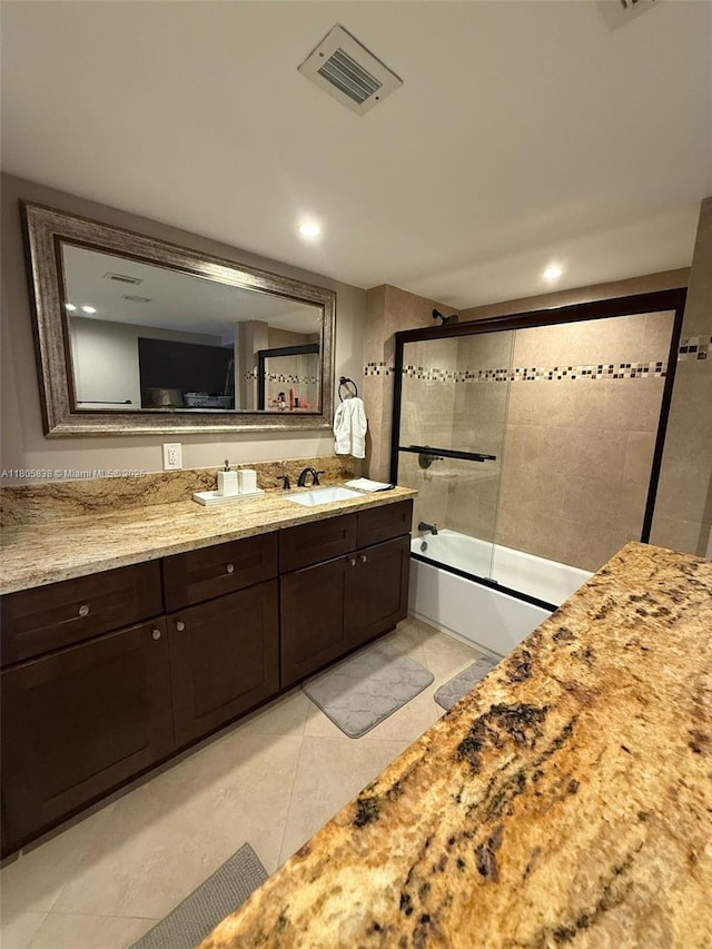 800 NE 195th St Unit 720, Miami, FL 33179 - bathroom with enclosed tub / shower combo, tile patterned flooring, vanity, and recessed lighting