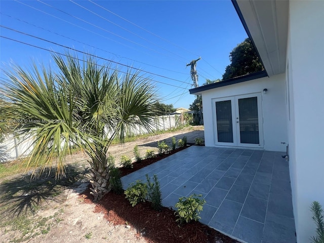 18740 NW 42nd Pl, Miami Gardens, FL 33055 - view of patio / terrace with french doors