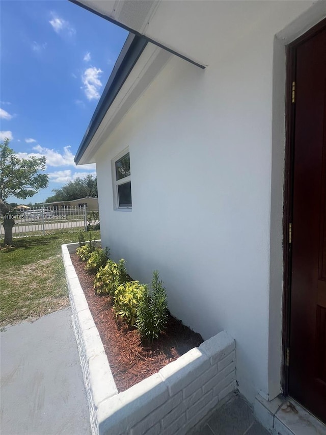 18740 NW 42nd Pl, Miami Gardens, FL 33055 - view of side of property featuring stucco siding