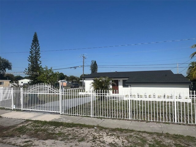 18740 NW 42nd Pl, Miami Gardens, FL 33055 - view of front facade with roof with shingles