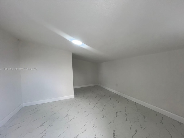 18740 NW 42nd Pl, Miami Gardens, FL 33055 - additional living space featuring light marble finish floors and baseboards