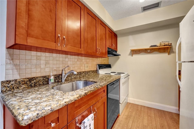 1561 NW 98th Ter, Pembroke Pines, FL 33024 - kitchen featuring a sink, under cabinet range hood, white appliances, baseboards, and light stone counters