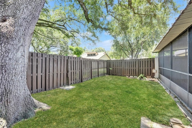 1561 NW 98th Ter, Pembroke Pines, FL 33024 - view of yard with a sunroom