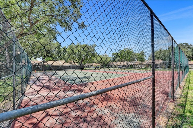 1561 NW 98th Ter, Pembroke Pines, FL 33024 - view of tennis court with fence