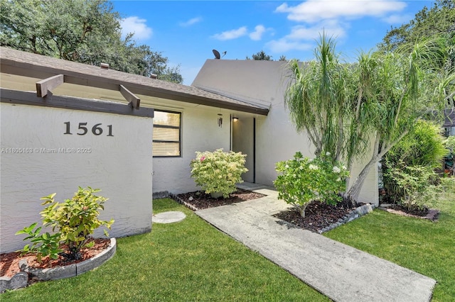 1561 NW 98th Ter, Pembroke Pines, FL 33024 - view of front facade with a front lawn