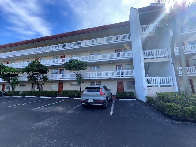 3776 Inverrary Blvd Unit 207R, Lauderhill, FL 33319 - view of apartment building / complex featuring uncovered parking