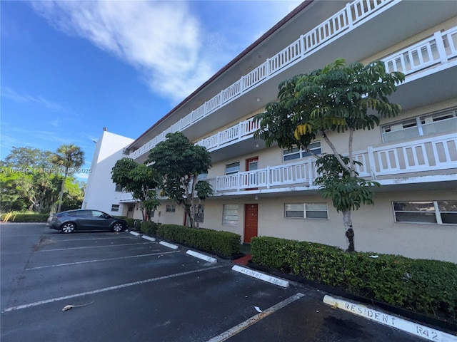 3776 Inverrary Blvd Unit 207R, Lauderhill, FL 33319 - view of property featuring uncovered parking