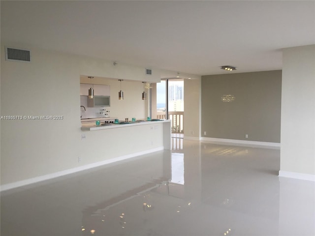 19707 Turnberry Way Unit 18D, Aventura, FL 33180 - spare room with a sink and baseboards