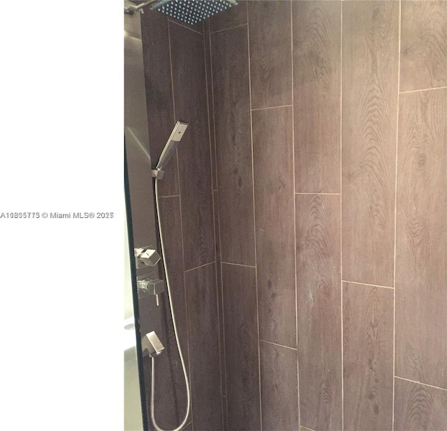 19707 Turnberry Way Unit 18D, Aventura, FL 33180 - bathroom view of a tile shower