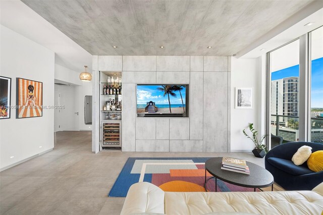 3470 E Coast Ave Unit H1201, Miami, FL 33137 - living area featuring wine cooler, a dry bar, and finished concrete floors
