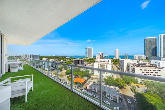 3470 E Coast Ave Unit H1201, Miami, FL 33137 - balcony featuring a city view and a water view