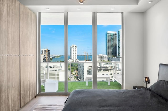 3470 E Coast Ave Unit H1201, Miami, FL 33137 - bedroom with floor to ceiling windows, a water view, and a city view