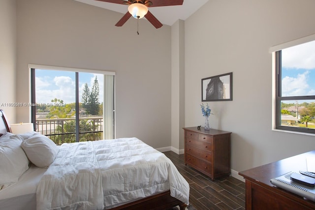 8395 SW 73rd Ave Unit 312, Miami, FL 33143 - bedroom featuring high vaulted ceiling, multiple windows, wood tiled floors, and access to exterior