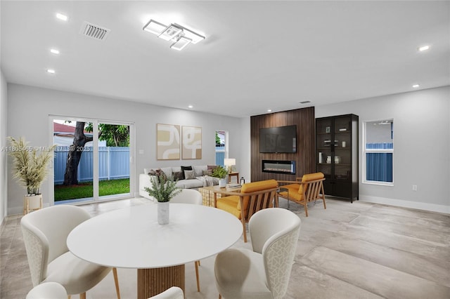 3431-3433 SW 16th Ter, Miami, FL 33145 - dining space featuring recessed lighting, a large fireplace, and baseboards