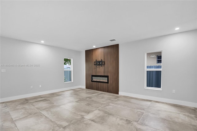 3431-3433 SW 16th Ter, Miami, FL 33145 - unfurnished living room with recessed lighting, a fireplace, and baseboards