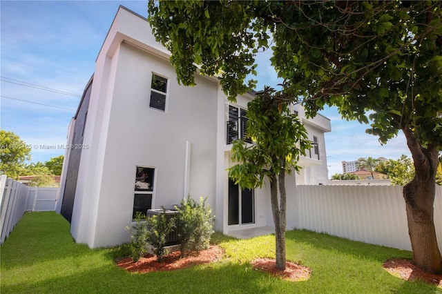 3431-3433 SW 16th Ter, Miami, FL 33145 - back of house with stucco siding