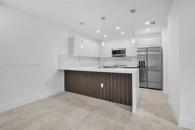 3431-3433 SW 16th Ter, Miami, FL 33145 - kitchen with appliances with stainless steel finishes, white cabinets, baseboards, modern cabinets, and tasteful backsplash