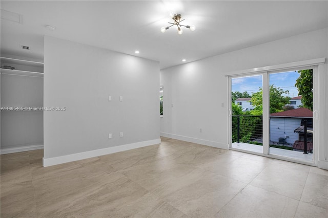 3431-3433 SW 16th Ter, Miami, FL 33145 - spare room featuring baseboards, a chandelier, and recessed lighting