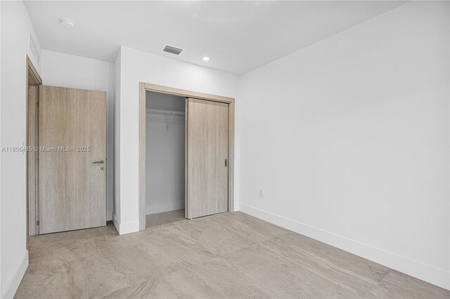 3431-3433 SW 16th Ter, Miami, FL 33145 - unfurnished bedroom featuring baseboards, a closet, and recessed lighting