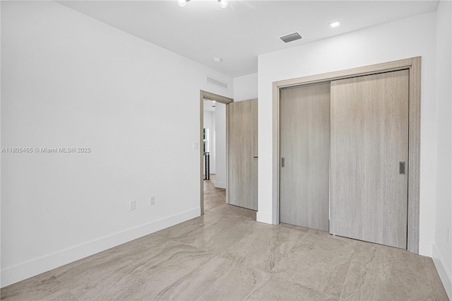 3431-3433 SW 16th Ter, Miami, FL 33145 - unfurnished bedroom with a closet and baseboards