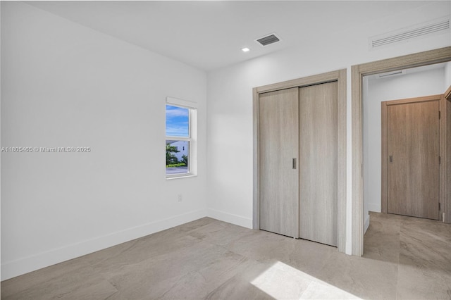 3431-3433 SW 16th Ter, Miami, FL 33145 - unfurnished bedroom featuring baseboards, a closet, and recessed lighting