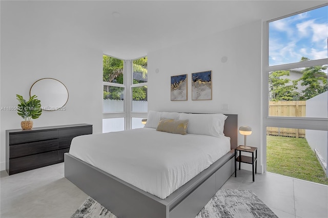 2345 SW 16th St, Miami, FL 33145 - bedroom with multiple windows and light tile patterned floors