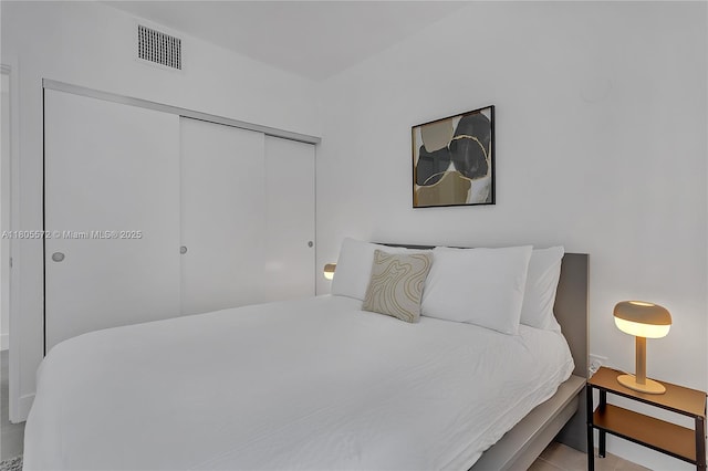 2345 SW 16th St, Miami, FL 33145 - tiled bedroom featuring a closet