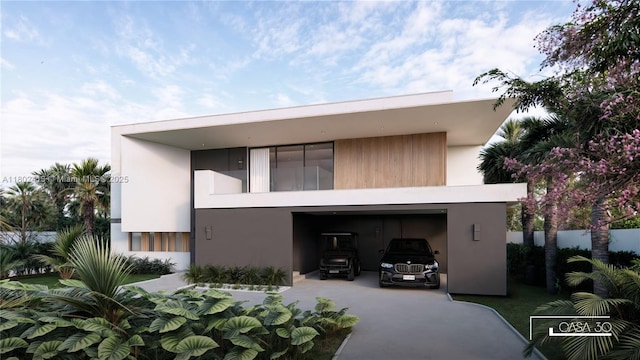 30 Samana Dr, Coconut Grove, FL 33133 - rear view of property with driveway, stucco siding, and a garage