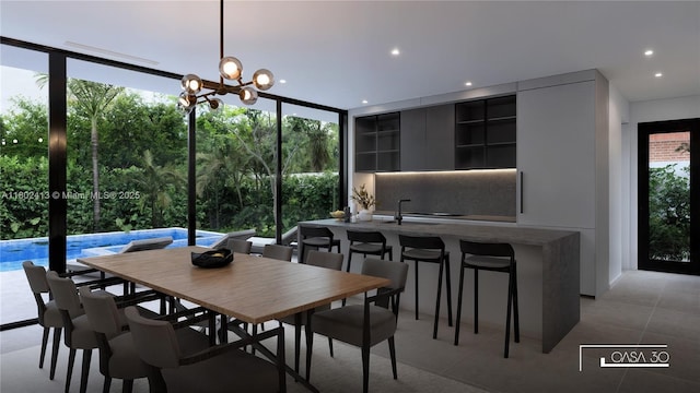 30 Samana Dr, Coconut Grove, FL 33133 - dining area with healthy amount of natural light, a chandelier, recessed lighting, light tile patterned floors, and a wall of windows
