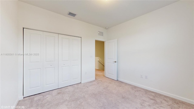 10004 SW 231st Ln, Miami, FL 33190 - unfurnished bedroom featuring carpet floors, baseboards, and a closet