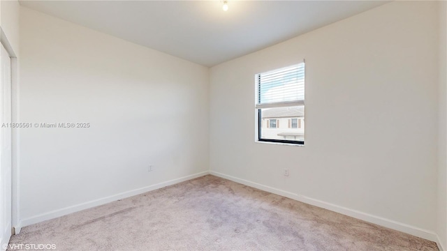 10004 SW 231st Ln, Miami, FL 33190 - empty room featuring carpet and baseboards