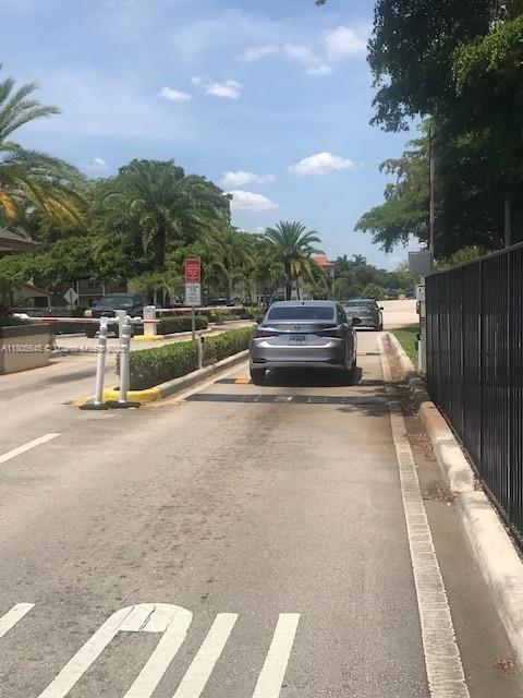 12500 SW 5th Ct Unit 210M, Pembroke Pines, FL 33027 - view of asphalt road with curbs