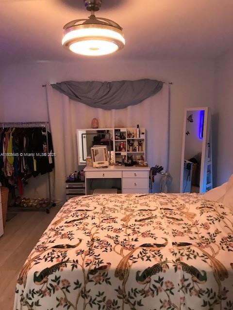 12500 SW 5th Ct Unit 210M, Pembroke Pines, FL 33027 - bedroom with wood finished floors