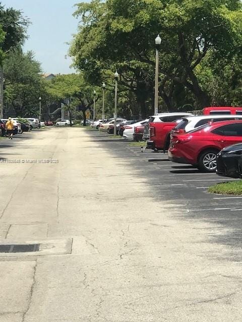 12500 SW 5th Ct Unit 210M, Pembroke Pines, FL 33027 - view of uncovered parking lot