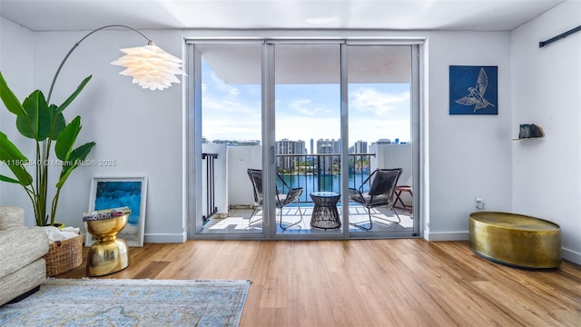 2750 NE 183rd St Unit 1610, Aventura, FL 33160 - living area with wood finished floors and baseboards
