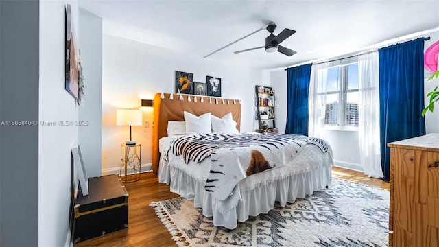 2750 NE 183rd St Unit 1610, Aventura, FL 33160 - bedroom featuring wood finished floors, baseboards, and a ceiling fan