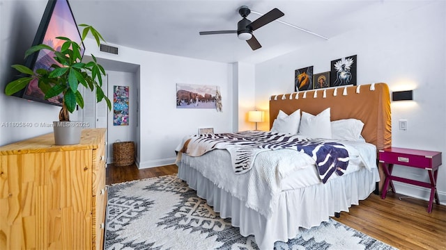 2750 NE 183rd St Unit 1610, Aventura, FL 33160 - bedroom with wood finished floors, baseboards, and ceiling fan