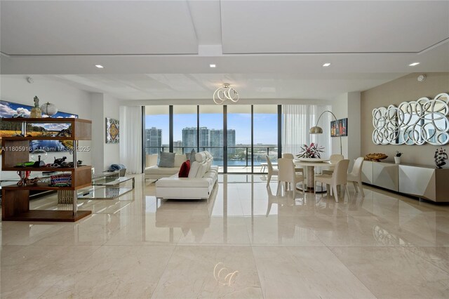 5500 Island Estates Dr Unit 1404 & 1405N, Aventura, FL 33160 - living room featuring a wall of windows, light marble finish floors, and recessed lighting