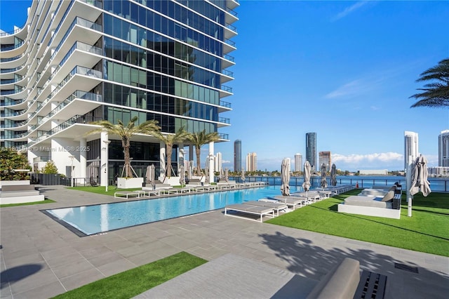 5500 Island Estates Dr Unit 1404 & 1405N, Aventura, FL 33160 - community pool with a view of city and a patio area