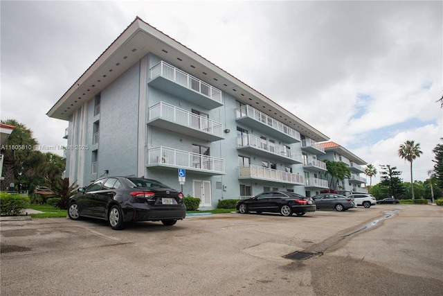 405 S Pine Island Rd Unit 405D, Plantation, FL 33324 - view of apartment building / complex with uncovered parking